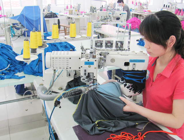 Sewing bamboo nightwear in clean factory environment