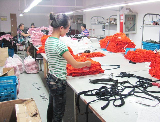 Team stitching bamboo t-shirts for global orders