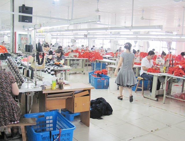 Workers sewing bamboo boxer briefs in factory